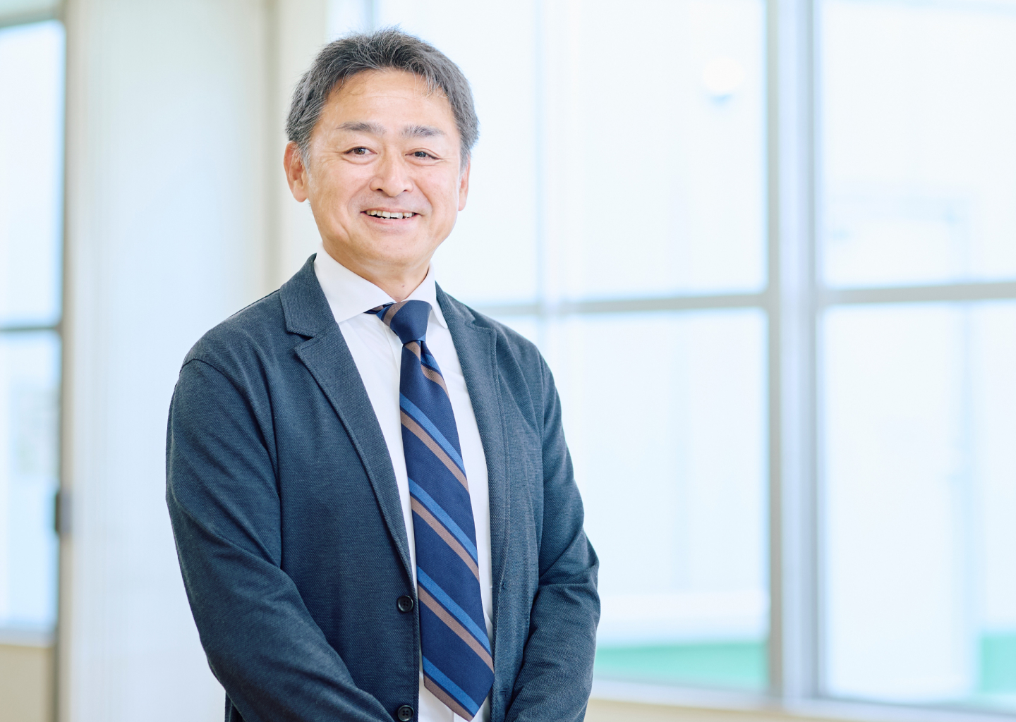 代表取締役 岡 達也